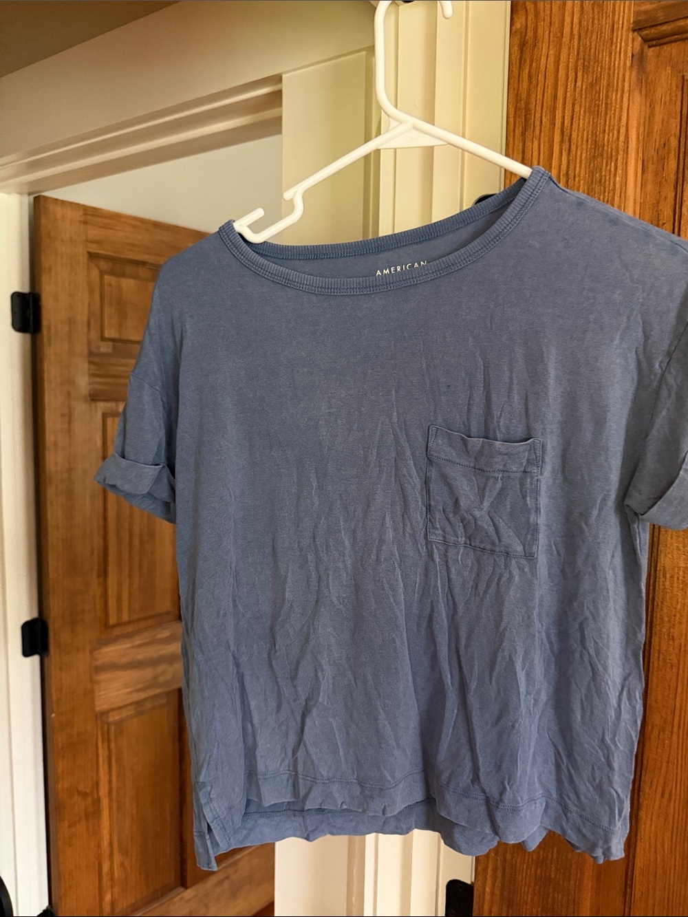 American Eagle Outfitters faded blue short sleeve pocket tee
